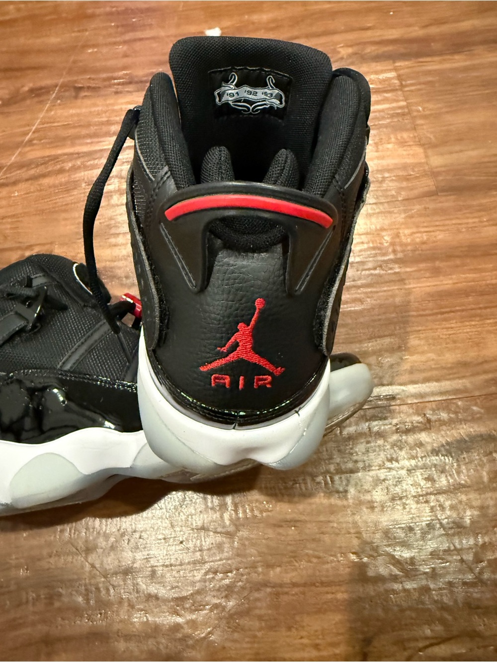 Jordan Men’s Black and Red Retro Basketball Sneakers - Picture 4 of 8